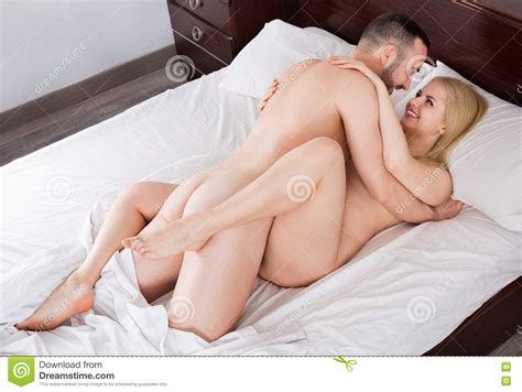 Pretty Positivecouple Having Sex In Bed Stock Image