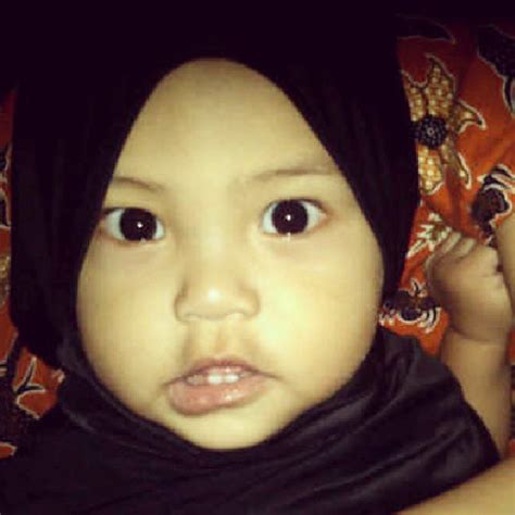 my cute niece in action now wears hijab for ramadan hehe… flickr