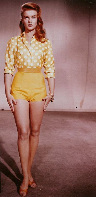 Ann Margret Showing Off Her Beautiful Legs In Saffron