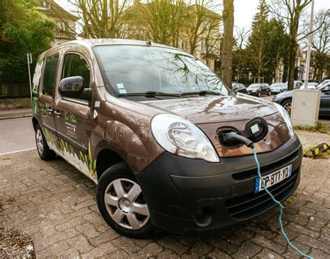 plugged  renault mini van electric car   street electric editorial photo image