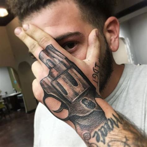 funky gun tattoos  hand