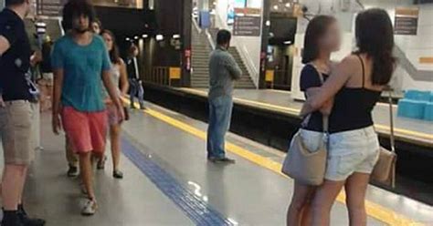 this photo of 2 girls kissing in a brazil subway is going viral you