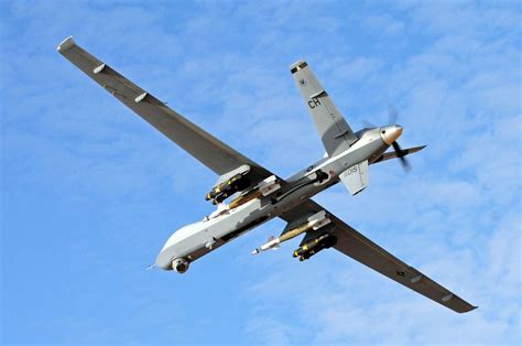 mq 9 reaper armed with paveways and hellfires with images military