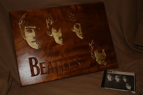 tim whitton carved norwegian wood  beatles wood carving
