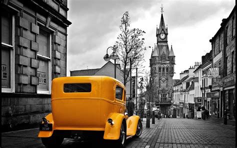 Vintage Yellow Car In A Gray City Wallpapers Hd Desktop