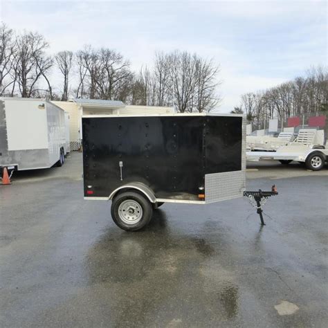 diamond cargo    black enclosed trailer    nose  single swing door  enclosed