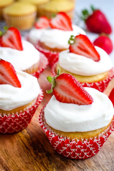 Strawberry Filled Cupcakes With Whipped Cream Frosting