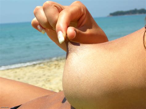woman pulling her own nipple on beach the free voyeurclouds