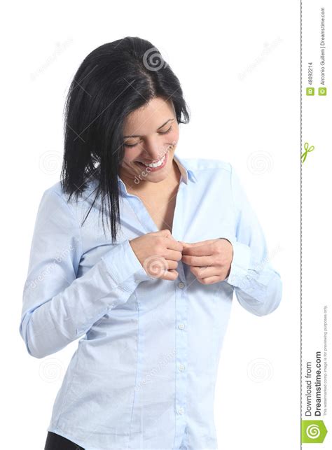 casual business woman undressing unbuttoning shirt stock