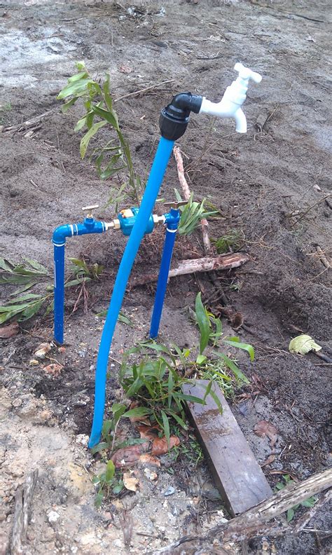 pemasangan paip  meter air oleh kontraktor satu membina rumah impian