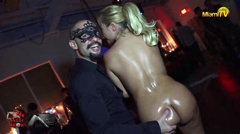 outrageous tv presenter jenny scordamaglia lets party guests grope her breasts and bum in her