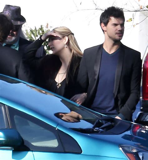 [photos] taylor lautner comforts billie lourd at mom and grandmother s funeral hollywood life