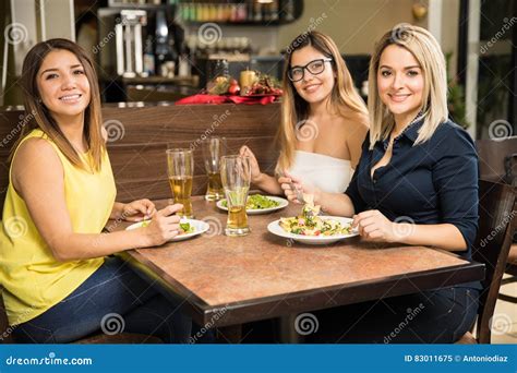 female friends eating   restaurant stock image image  casual dinner
