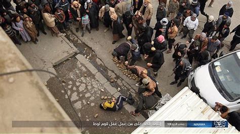 isis release images from public execution in mosul daily mail online