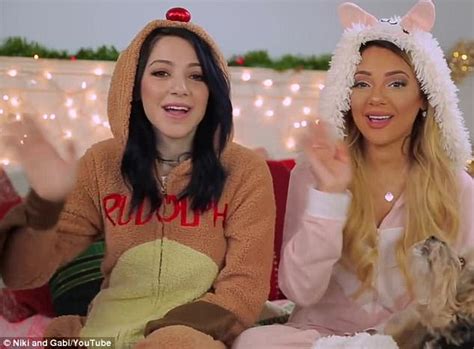 twin youtube stars niki and gabi spend 24 hours conjoined daily mail