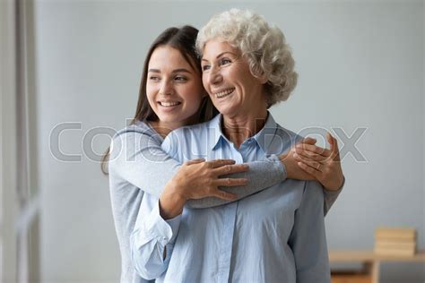 happy mature mom and grown up daughter stock image colourbox