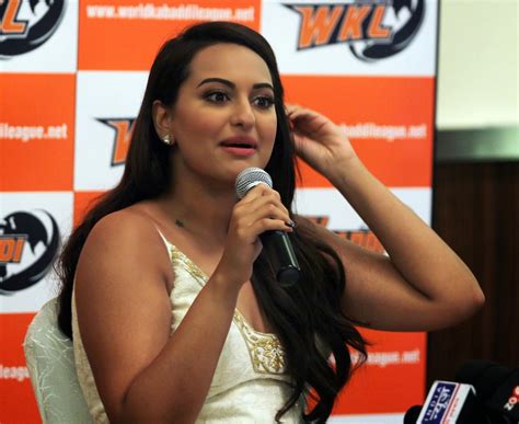 high quality bollywood celebrity pictures sonakshi sinha sexy cleavage show in white dress at