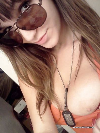 sexy amateur hottie enjoys taking selfies while showing