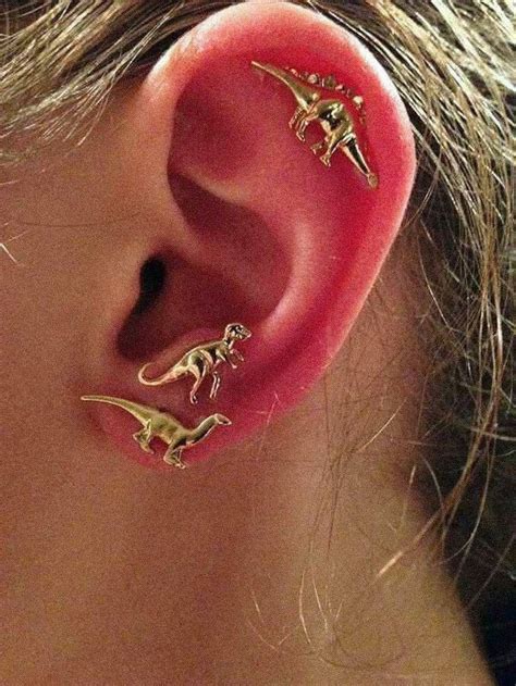 pin  sd  aesthetic dinosaur earrings earings piercings