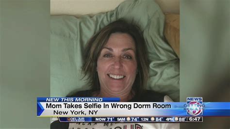 mother takes selfie in wrong bed