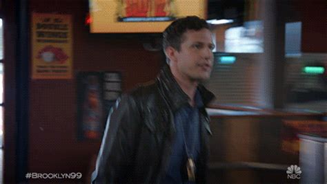 high five andy samberg by brooklyn nine nine find and share on giphy