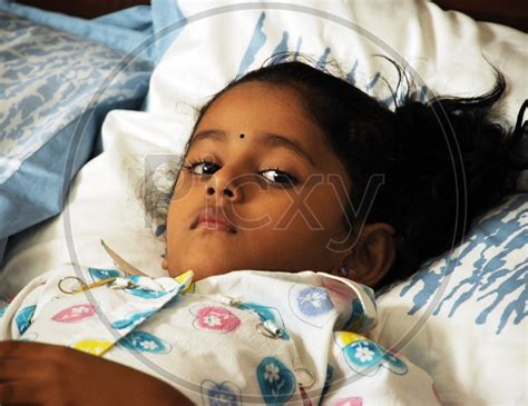 Image Of Indian Girl Smiling Sleeping In The Bed Ud780437 Picxy
