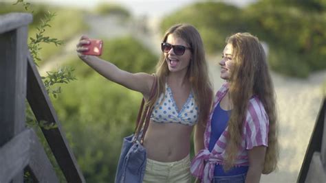 stock video of cute teen girls take fun selfies 13101347 shutterstock