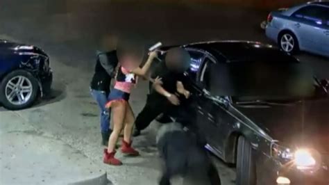 video woman pulls gun from underwear opens fire at gas