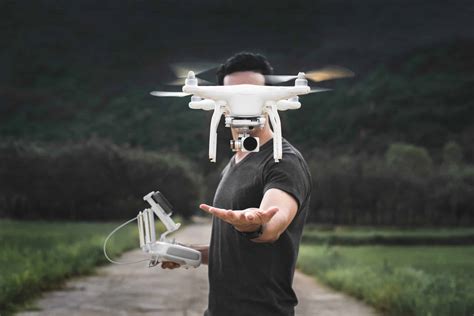 man releasing drone  air coverdrone australia