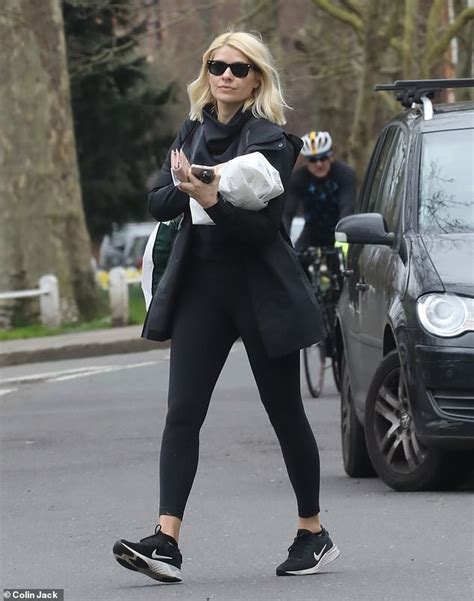 holly willoughby is seen stocking up on goods at her local shops amid