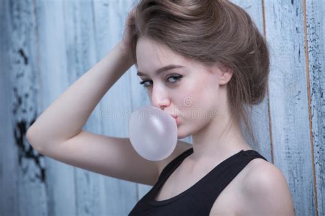 Girl With Pink Bubble Of Chewing Gum Stock Image Image Of Face