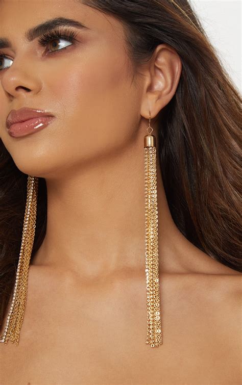 gold extra long tassel chain earrings prettylittlething usa