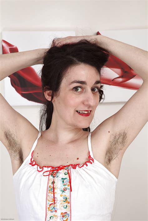 ugly mature woman with hairy armpits and pussy strips on camera