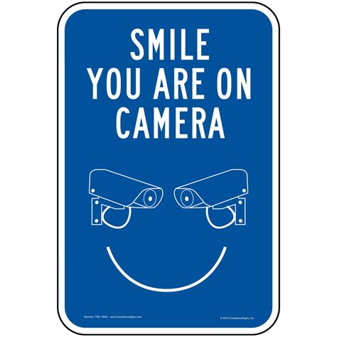vertical sign security camera smile    camera sign