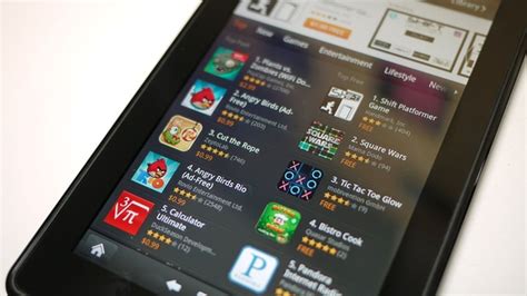 amazon developing larger kindle fire tablet  apple plans   ipad  nyt  verge