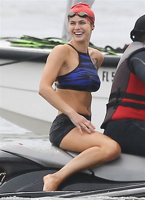 Alexandra Daddario Dashes Across Beach In Bikini Top And Shorts While