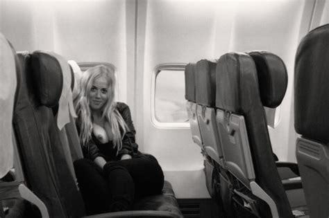 exposing her tits on an empty airplane porn pic eporner free download