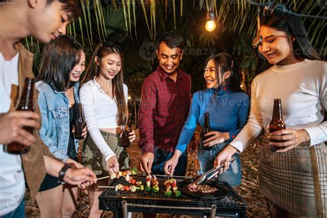 Happy Asian Friends Cheering With Barbecue Dinner Outdoor Group Of