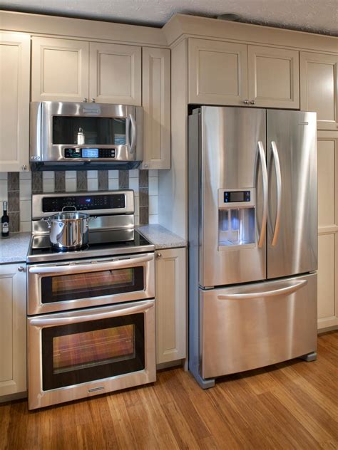 Neutral Kitchen Cabinets With Stainless Steel Refrigerator
