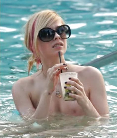 canadian singer avril lavigne nude in pool with a friend