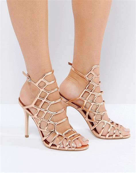 steve madden slithur rose gold caged heeled sandals in metallic lyst