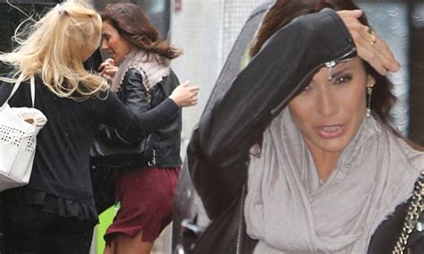 natalie imbruglia battles wild wind and rain in a flimsy mini dress daily mail online