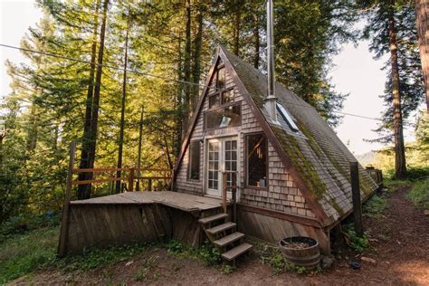 this tiny house looks like a roof in the middle of the
