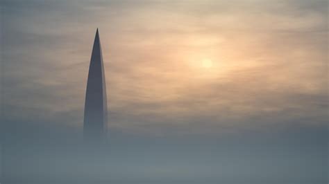 premium photo  skyscraper tower sticks    thick fog aerial view   foggy morning