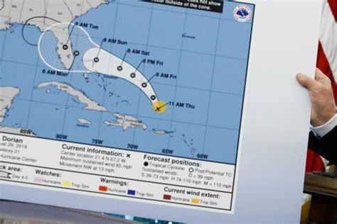 trump displays hurricane map altered  include alabama