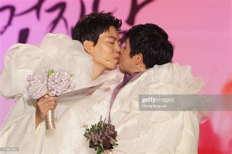 director kim jho kwang soo kisses his partner kim seung hwan during