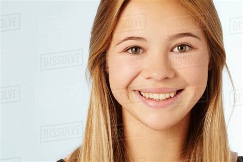 close   teenage girls smiling face stock photo dissolve