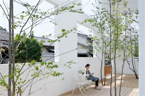 sou fujimotos house  captures sunlight  fresh air   series  nested boxes house  sou