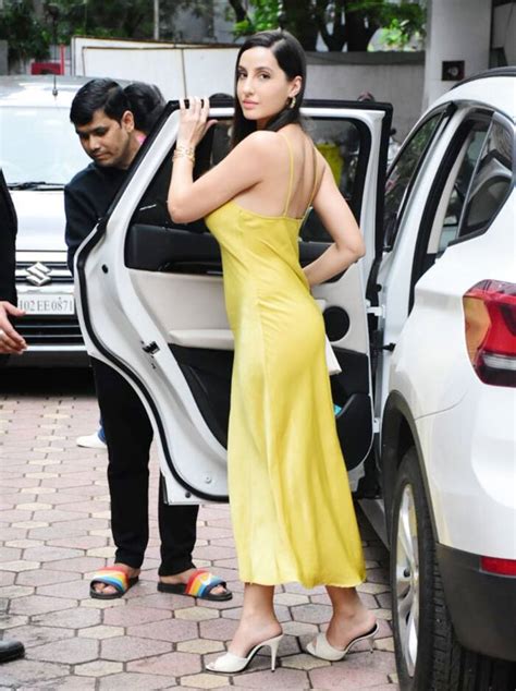 Nora Fatehi Oozes Oomph In Yellow High Slit Dress See Viral Photos