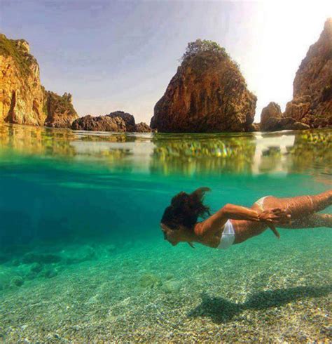bikini babe s thumb position in underwater photo shocks internet